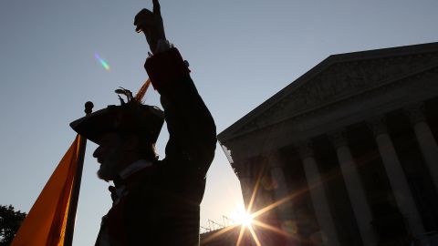 A protester in front of the Supreme Court on Thursday. 