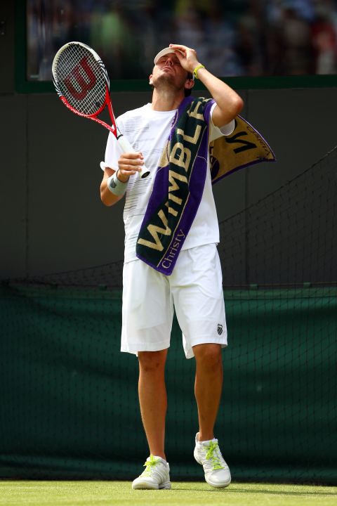 Mardy Fish of the United States reacts June 28 during his second-round match against James Ward of Great Britain.