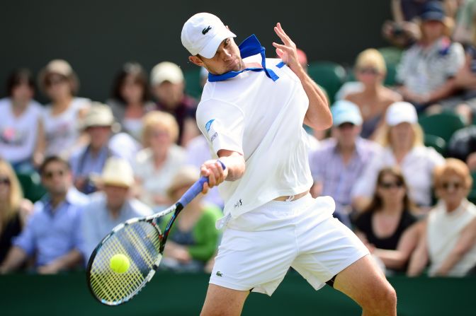 Andy Roddick of the United States plays a forehand shot during his second-round match against Bjorn Phau of Germany on June 28.