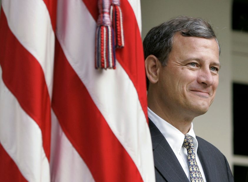 Chief Justice John Roberts, a conservative appointed by President George W. Bush, sided with the Supreme Court's liberal wing on June 28 in upholding the controversial health care reform law. Roberts is seen here in 2005.