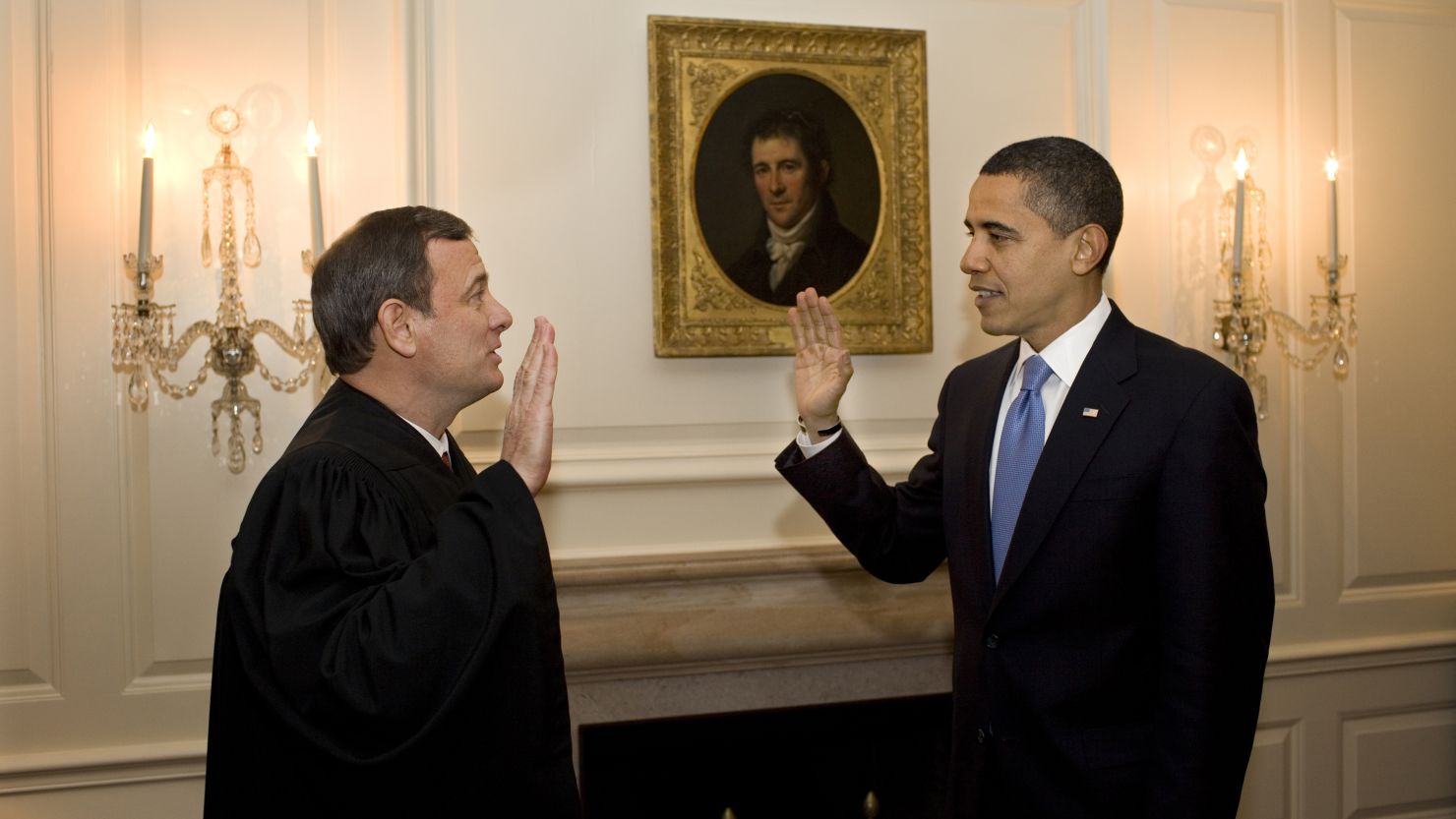 Chief Justice John Roberts re-administers the oath of office to Barack Obama at the White House on January 21, 2009. 