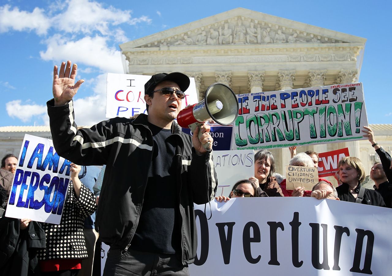 <strong>Citizens United v. Federal Election Commission (2010):</strong> Activists rally in February 2012 to urge the Supreme Court to overturn its decision that fundamentally changed campaign finance law by allowing corporations and unions to contribute unlimited funds to political action committees not affiliated with a candidate.