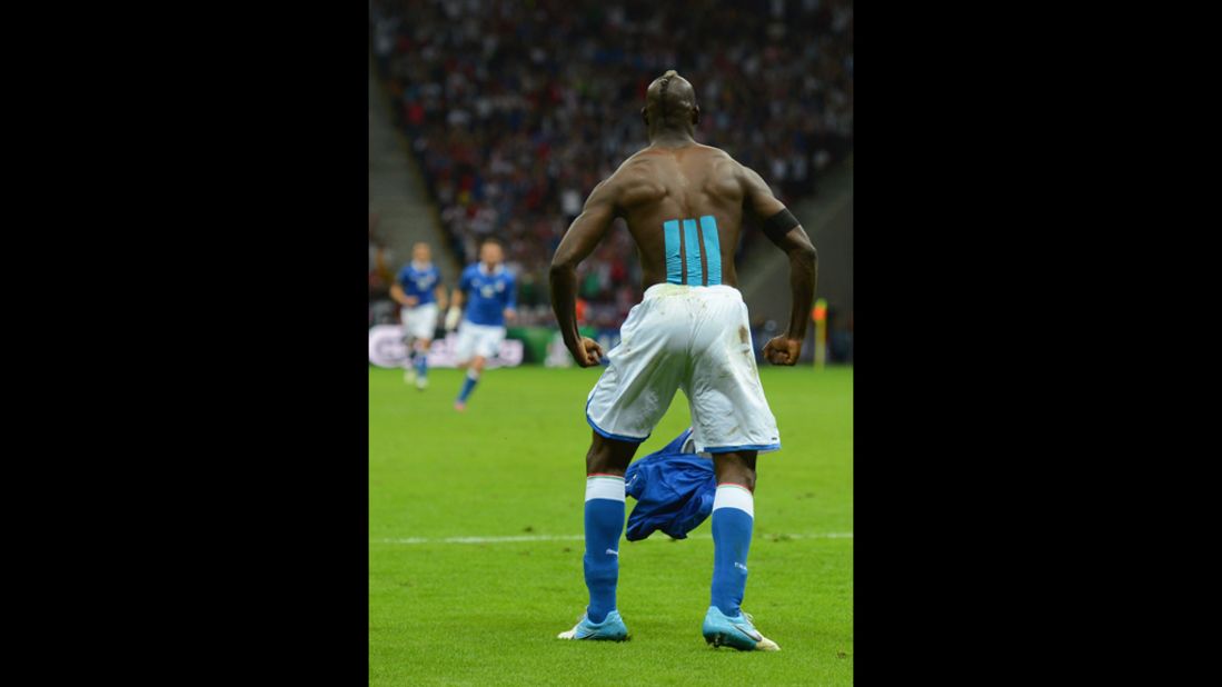 Mario Balotelli of Italy celebrates after scoring his team's second goal.