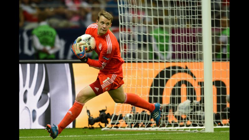 German goalkeeper Manuel Neuer grabs the ball.