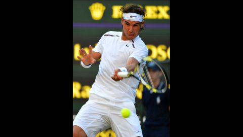 Spain's Rafael Nadal plays a forehand shot during his second-round men's singles match against Czech Republic's Lukas Rosol June 28.