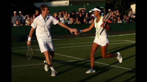 Jonathan Marray and Anne Keothavong of Great Britain during the mixed doubles first-round match against Paul Hanley of Australia and Alla Kudryavtseva of Russia June 28.