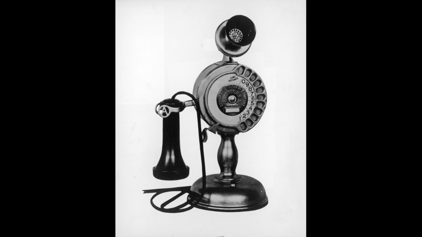 Rotary-dial telephones with separate mouthpieces and receivers were commonly referred to as "candlestick" phones. This model from the mid-1930s features the rotary dial in the shaft of the telephone.