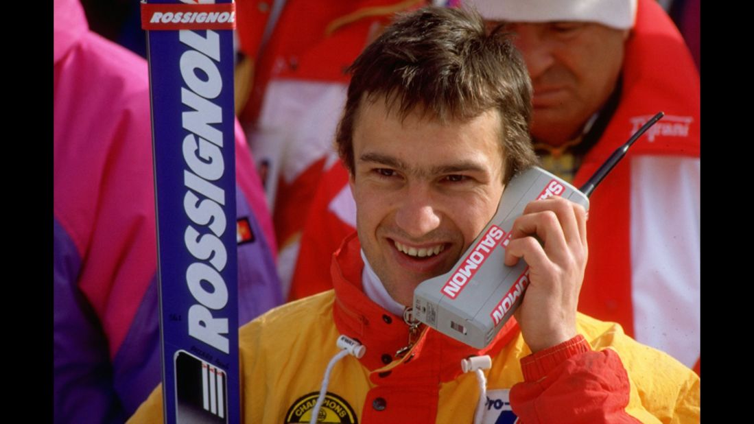 Franck Piccard of France talks on a mobile phone after the Mens Super G Slalom event at the 1988 Winter Olympic Games in Calgary, Canada. He won the gold medal. The phone, however, was shut out.