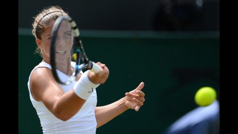 Italy's Sara Errani returns a forehand shot to Anne Keothavong of Britain on June28. Errani defeated Keothavong 6-1, 6-1.