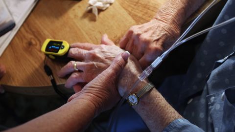 Registered nurse Susan Eager pays a house call visit to a patient on March 26, 2012 in Denver, Colorado. (Photo by John Moore/Getty Images)