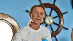 British-born Australian World Champion Marathon Swimmer and world record in open water swimming, Penny Palfrey (C), accompanied by her husband Chris Palfrey (L) and Cuban commodore of the Nautic Club, Jose Miguel Diaz, gives a press conference in Havana on June 28, 2012. Penny is in Cuba to try and swim -- without the aid of a shark cage -- across the Florida Strait from Havana to Key West, in the US, to celebrate the 20th anniversary of the Ernest Hemingway Nautical Club of Havana.  AFP PHOTO/ADALBERTO ROQUE        (Photo credit should read ADALBERTO ROQUE/AFP/GettyImages)