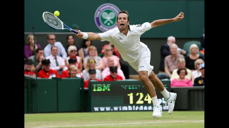 Stepanek reaches out to make a forehand return against Djokovic on Friday.