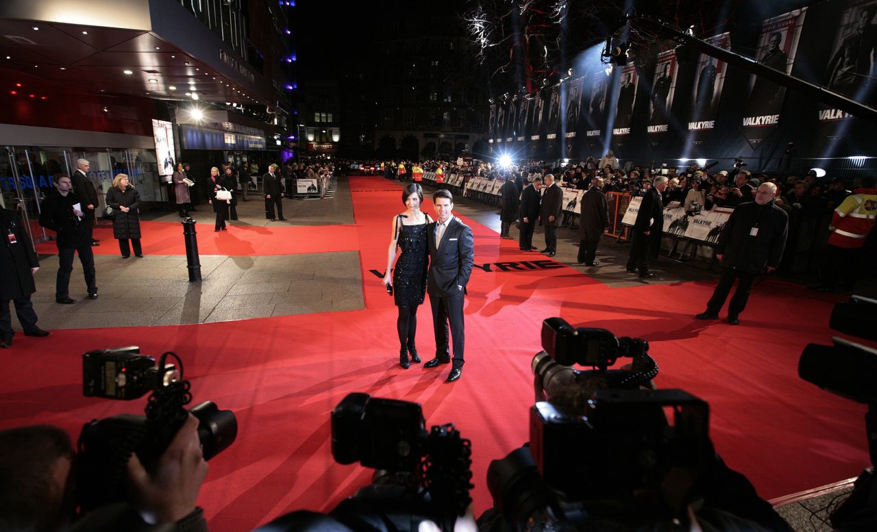 They pose for photos on the red carpet at the London premiere of his film "Valkyrie" in January 2009.