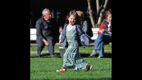 Suri Cruise, the daughter of Tom Cruise and Katie Holmes, plays in the Charles River Basin on October 10, 2009, in Cambridge, Massachusetts. Holmes and Cruise were married in November 2006 after Suri, their only child, was born in April of that year.