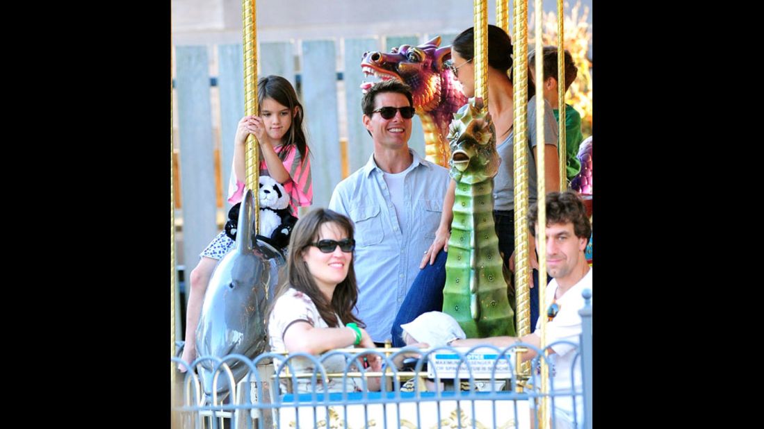 Cruise and Holmes visit Schenley Plaza's carousel with daughter Suri in October 2011 in Pittsburgh.  Holmes' lawyer released a statement saying, "This is a personal and private matter for Katie and her family. Katie's primary concern remains, as it always has been, her daughter's best interest."