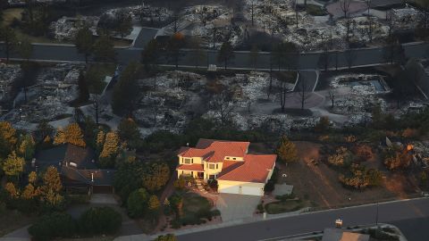 One home stands surrounded by others destroyed by the Waldo Canyon fire in Colorado Springs on Saturday.