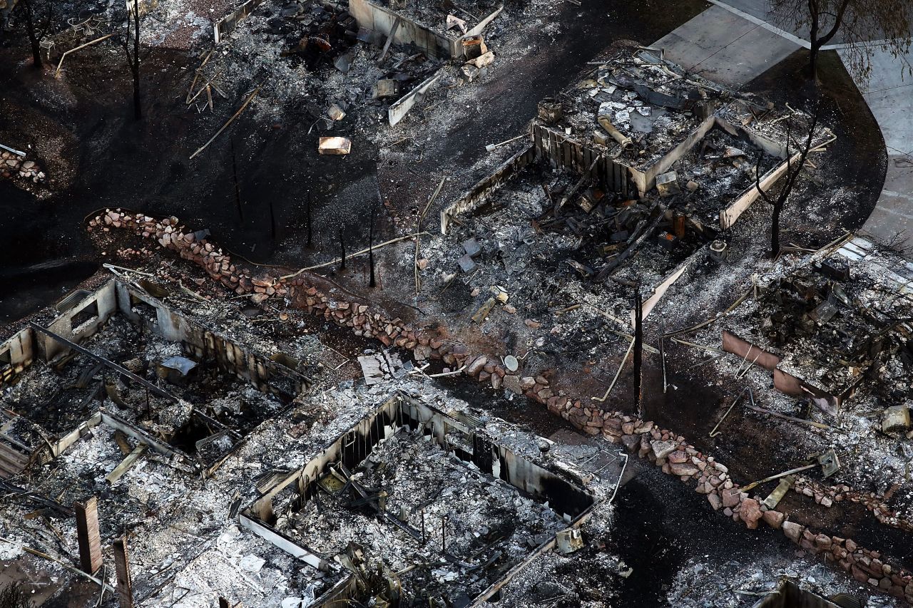 Homes burned to the ground by the Waldo Canyon fire are seen in a neighborhood in Colorado Springs on Saturday.