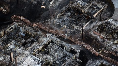 Homes burned to the ground by the Waldo Canyon fire are seen in a neighborhood in Colorado Springs on Saturday.