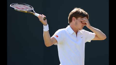David Goffin of Belgium reacts Saturday to losing a point during his third round men's singles match against Mardy Fish of the United States.