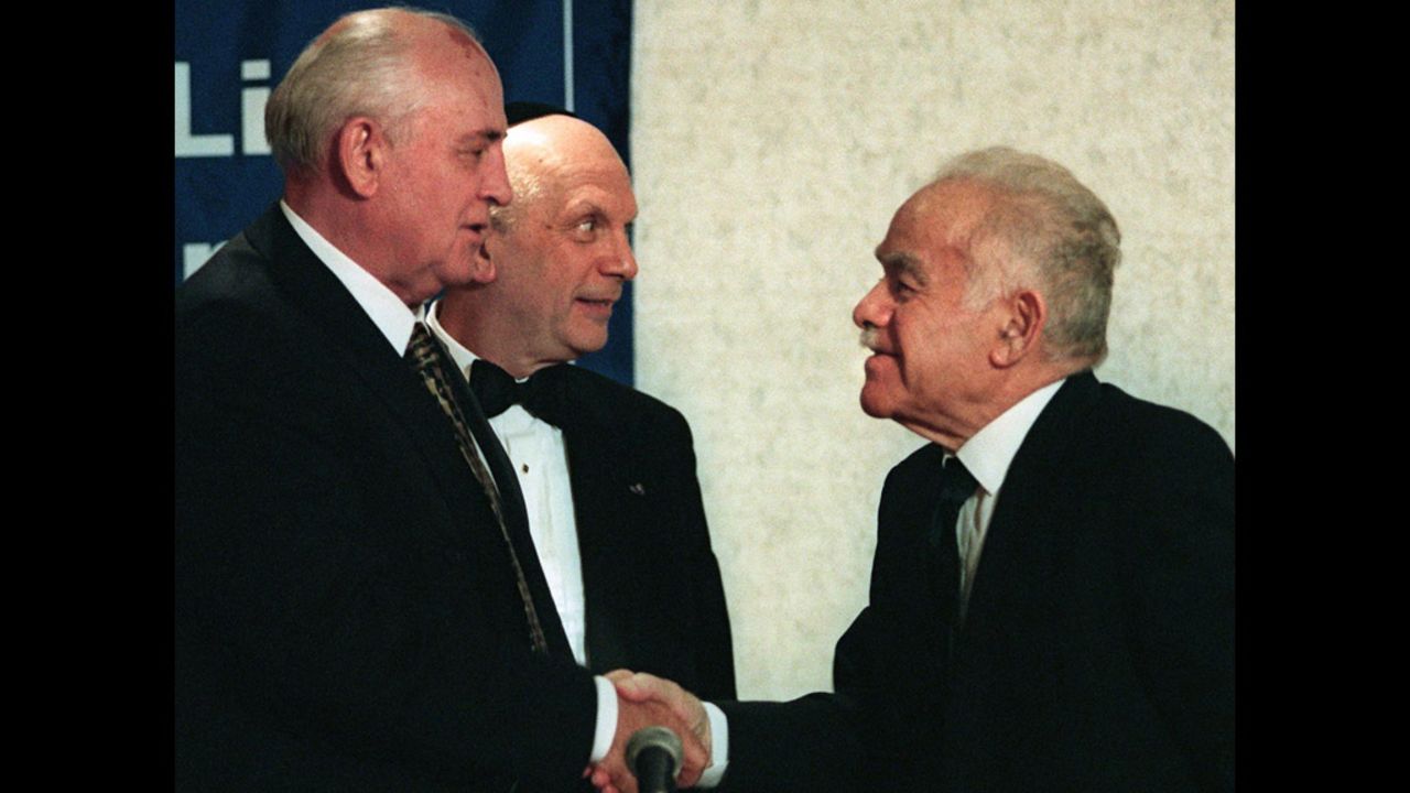 Former Soviet President Mikhail Gorbachev and Shamir shake hands in New York before a dinner sponsored by Israel Bonds in October 1998. Gorbachev was honored for allowing mass emigration of Jews to Israel starting in 1988. Shamir, who led the right-wing Likud bloc, served as prime minister from 1983 to 1984 and from 1986 to 1992. 