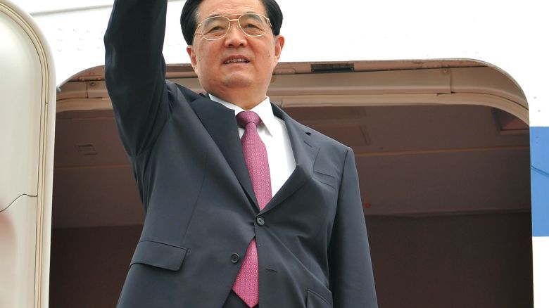 Chinese President Hu Jintao waves upon his arrival on June 29, 2012.