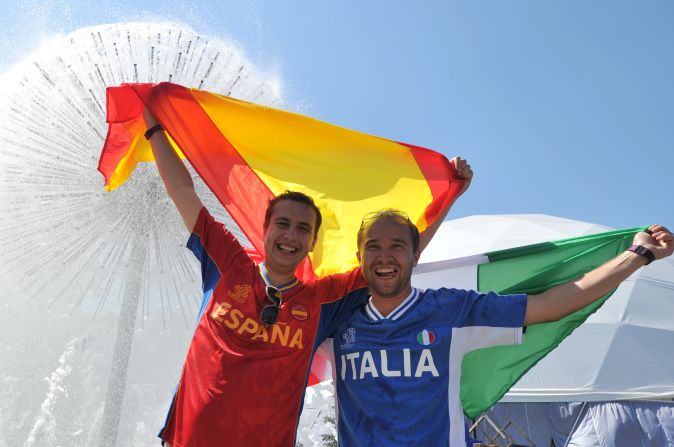 Spanish and Italian supporters mingle in Kiev's fan zone before Sunday's big game.   