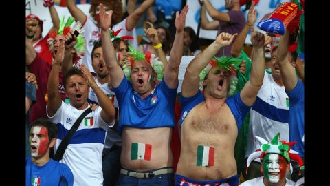 Italy fans cheer ahead of the match against Spain.