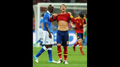 Spain's Sergio Ramos of Spain reacts next to Mario Balotelli of Italy during the match on Sunday.
