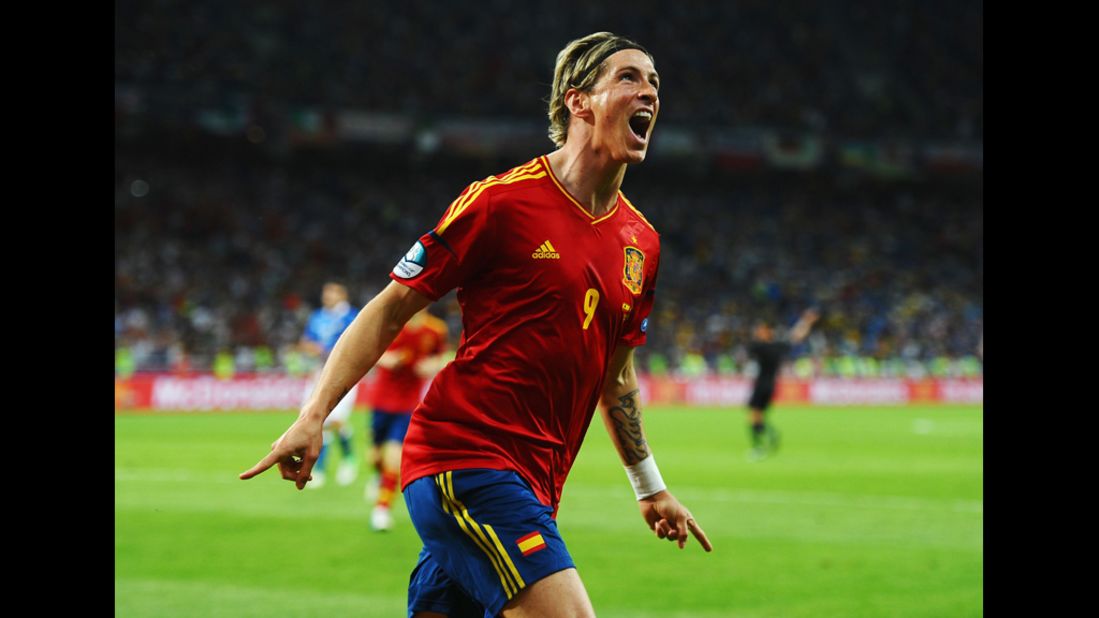 Fernando Torres of Spain celebrates scoring his team's third goal against Italy.