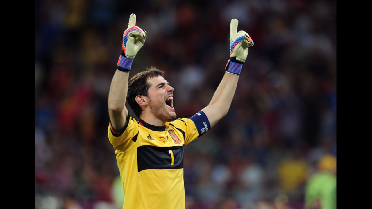 Goalkeeper Iker Casillas of Spain celebrates after his team's third goal against Italy.