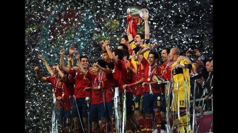 Captain Iker Casillas of Spain lifts the trophy after the team defeated Italy 4-0 in the Euro 2012 final on Sunday, July 1, in Kiev, Ukraine.