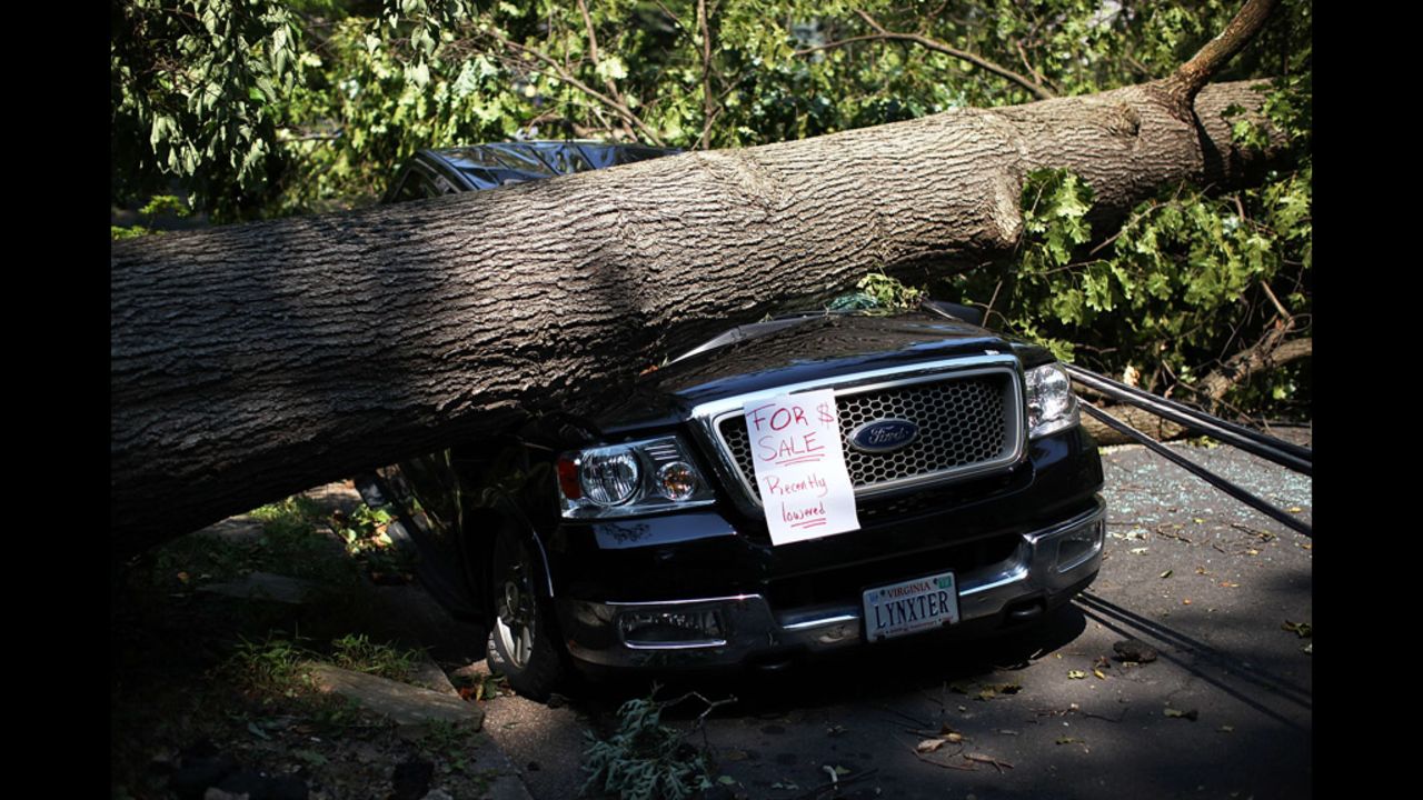 An owner left a note on his truck after it was damaged by a downed tree in Falls Church, Virginia. 
