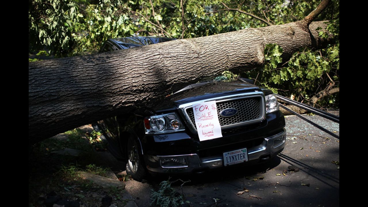 An owner left a note on his truck after it was damaged by a downed tree in Falls Church, Virginia.