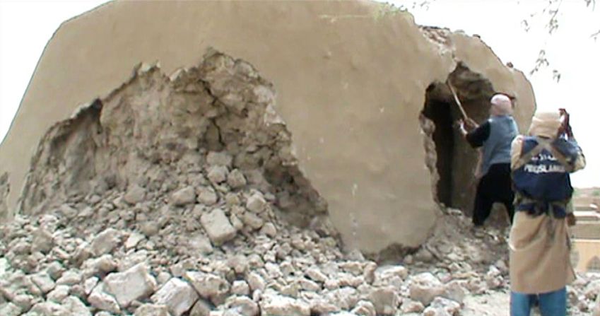 Islamists have established themselves in the northern part of Mali, where they have repeatedly targeted Timbuktu's ancient burial sites, which they regard  as idolatrous. <br />Pictured, Islamist militants destroy an ancient shrine in Timbuktu on July 1, in a still from a video.