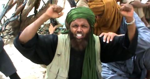 An Islamist militant celebrates and shouts "Allahu Akbar" (God is Greatest) after destroying an ancient shrine in Timbuktu.