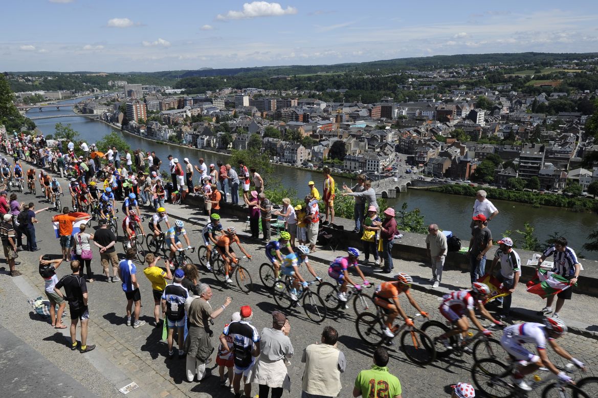 Fans cheer on riders as they climb the Cote de la Citadelle de Namur (Climb of Namur Citadel) during Stage 2, which takes place in Belgium.