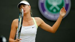 World No. 1 Maria Sharapova shows her disappointment after losing to Sabine Lisicki in the fourth round at Wimbledon, ending the Russian's hopes of repeating her 2004 success.