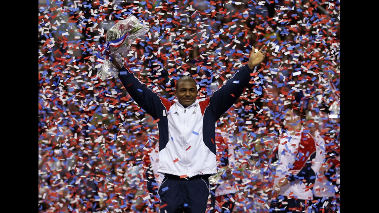 John Orozco celebrates in the confetti after being named to the U.S. Gymnastic team that will go to the 2012 London Olympics.