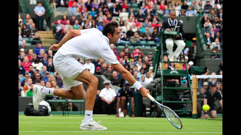 Croatia's Marin Cilic reaches for a shot during his match against Britain's Andy Murray.