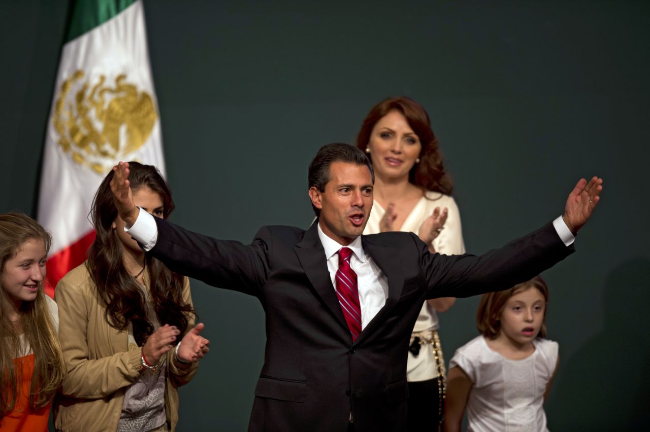 Peña Nieto celebrates with his family after projections declared him the apparent victor in Mexico's presidential election on Sunday, July 1.