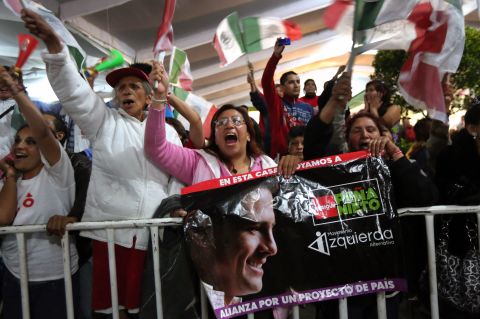 Peña Nieto's supporters cheer during the victory speech in Mexico City on Sunday. The results would mean a return to power for a party that ruled Mexico for more than 70 years.