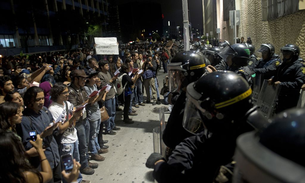 Protesters supporting the "I Am 132" movement rally outside Televisa headquarters in Mexico City on Saturday.