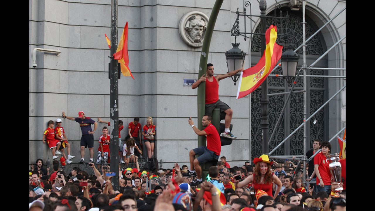 Spain fans gather in Madrid to congratulate their team on Monday.