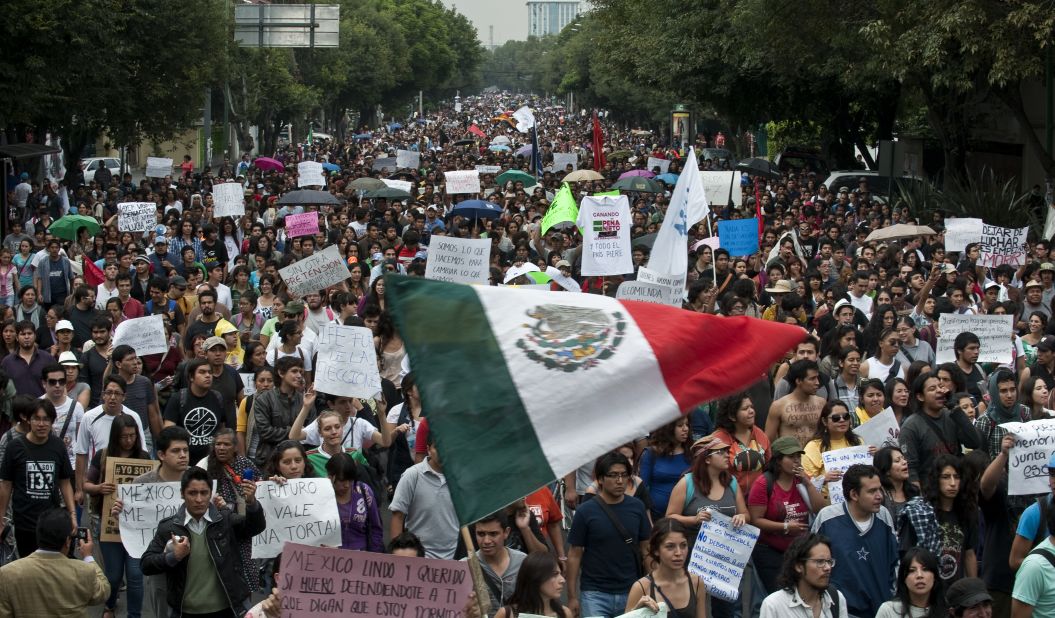 Thousands of protesters take to the streets in Mexico City on Monday, a day after the presidential election results were announced. Supporters of the opposition candidate were rallying against Enrique Peña Nieto, who declared victory late Sunday.