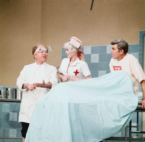 From left, Mickey Rooney, Connie Stevens and Griffith in a hospital room set in 1972.