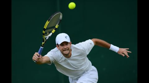 U.S. player Brian Baker plays a forehand shot during his fourth round men's singles defeat to Germany's Philipp Kohlschreiber on Day Eight of Wimbledon.