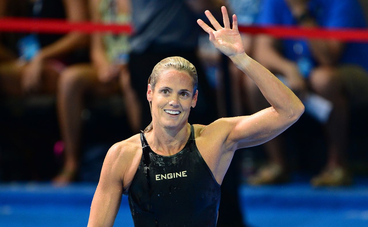 Dara Torres, the 45-year-old 12-time Olympic medalist, waves to the crowd after failing to qualify for what would have been her sixth Olympics.