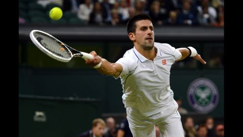 Serbia's Novak Djokovic plays a forehand shot during his fourth round men's singles victory over Serbia's Viktor Troicki on Day Seven of the Wimbledon championships on Monday, July 2. 