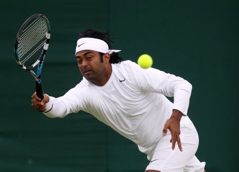 Leander Paes of India plays a forehand as he and Radek Stepanek of the Czech Republic play a doubles match against Ivan Dodig of Croatia and Marcelo Melo of Brazil on Tuesday.