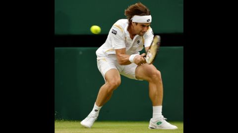 Spain's David Ferrer plays a double-handed backhand shot during his fourth round men's singles match against Argentina's Juan Martin Del Potro on Tuesday.